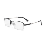 Schwarze Gleitsicht-Lesebrille mit Mehrzonen-Gläsern auf einem Holztisch