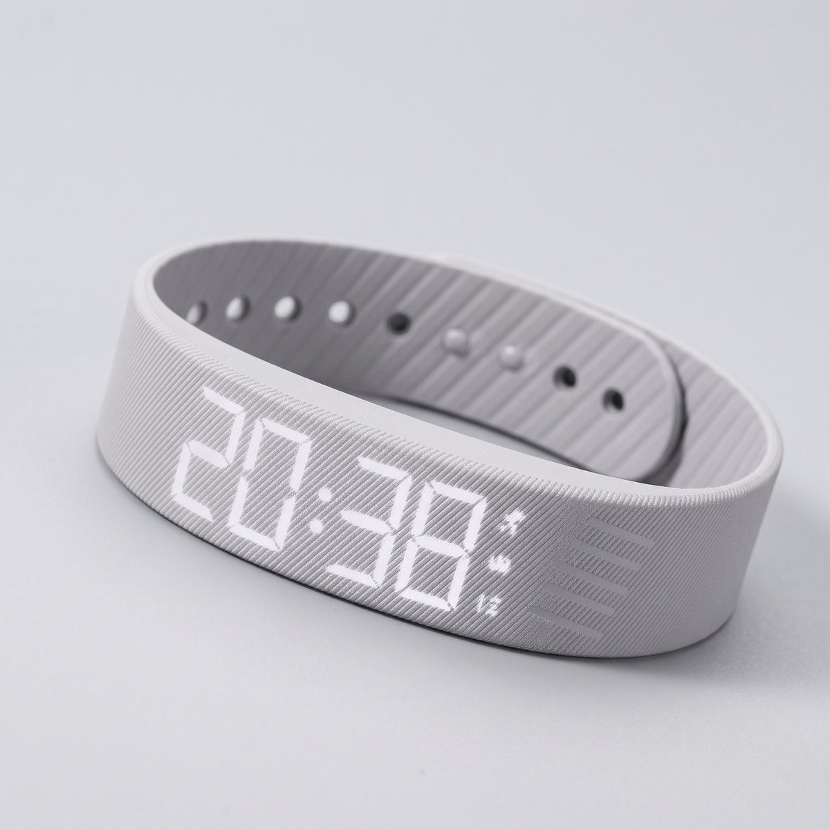 Schwarzes Wecker-Armband mit LED-Anzeige und Vibrationsalarm am Handgelenk