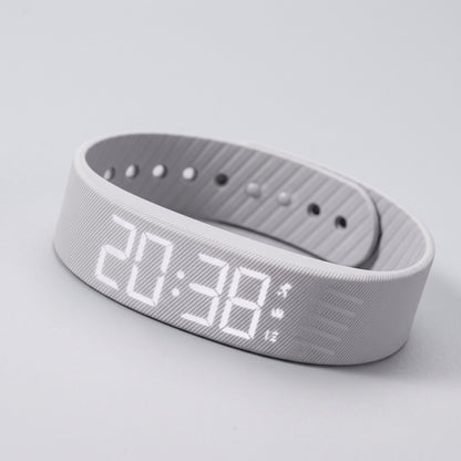 Schwarzes Wecker-Armband mit LED-Anzeige und Vibrationsalarm am Handgelenk