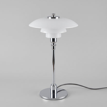 Tischlampe Glow aus geschichtetem Glas mit Metallfuss, leuchtet warmweiss